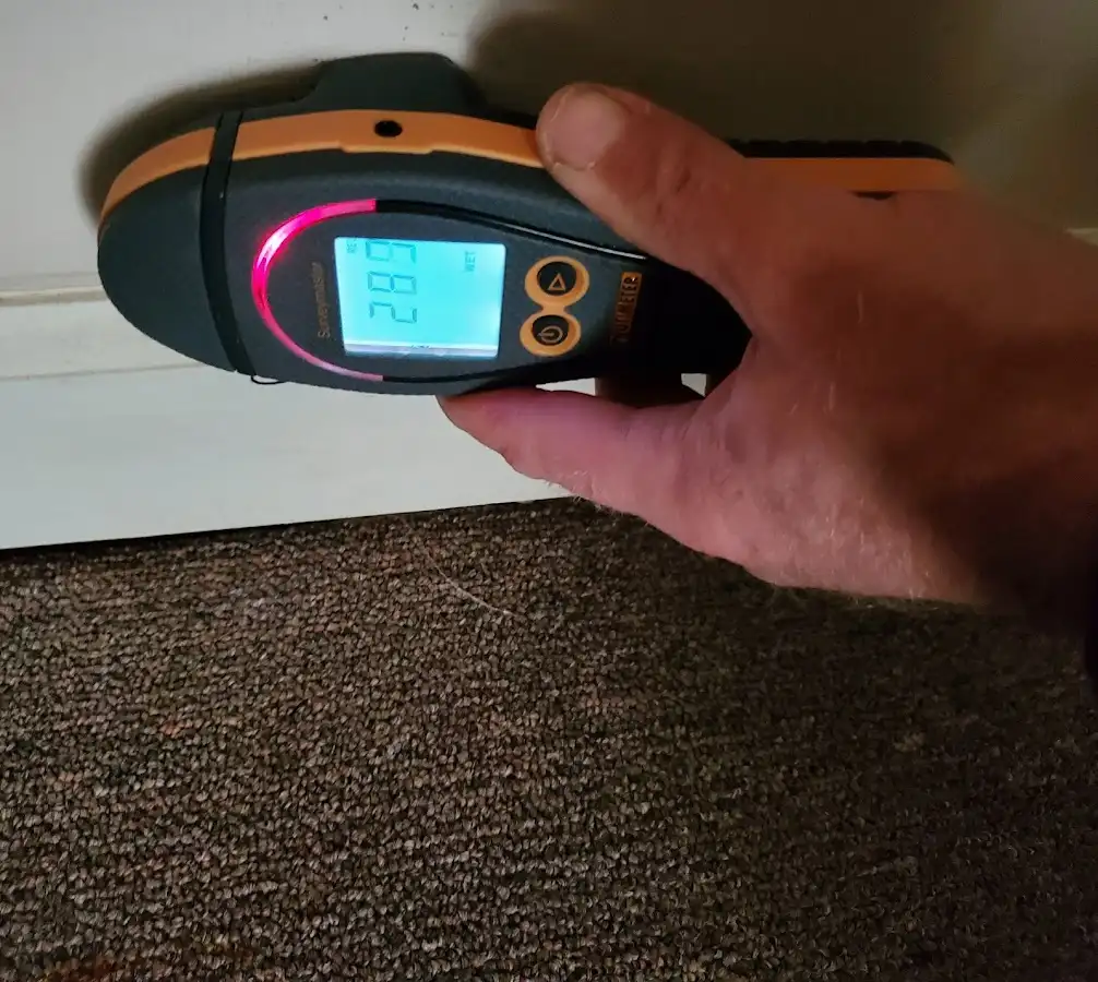 Moisture detection at baseboard during Storm Damage Restoration in Grandview Heights